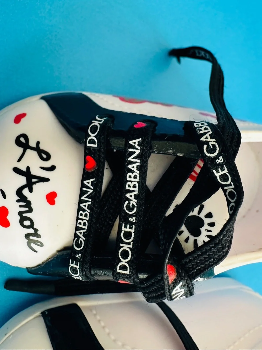 Dolce & Gabbana Doll White Sneakers with Black Laces and Red Heart Accents